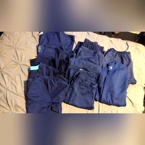 Lot of 11 scrubs Medium/Large